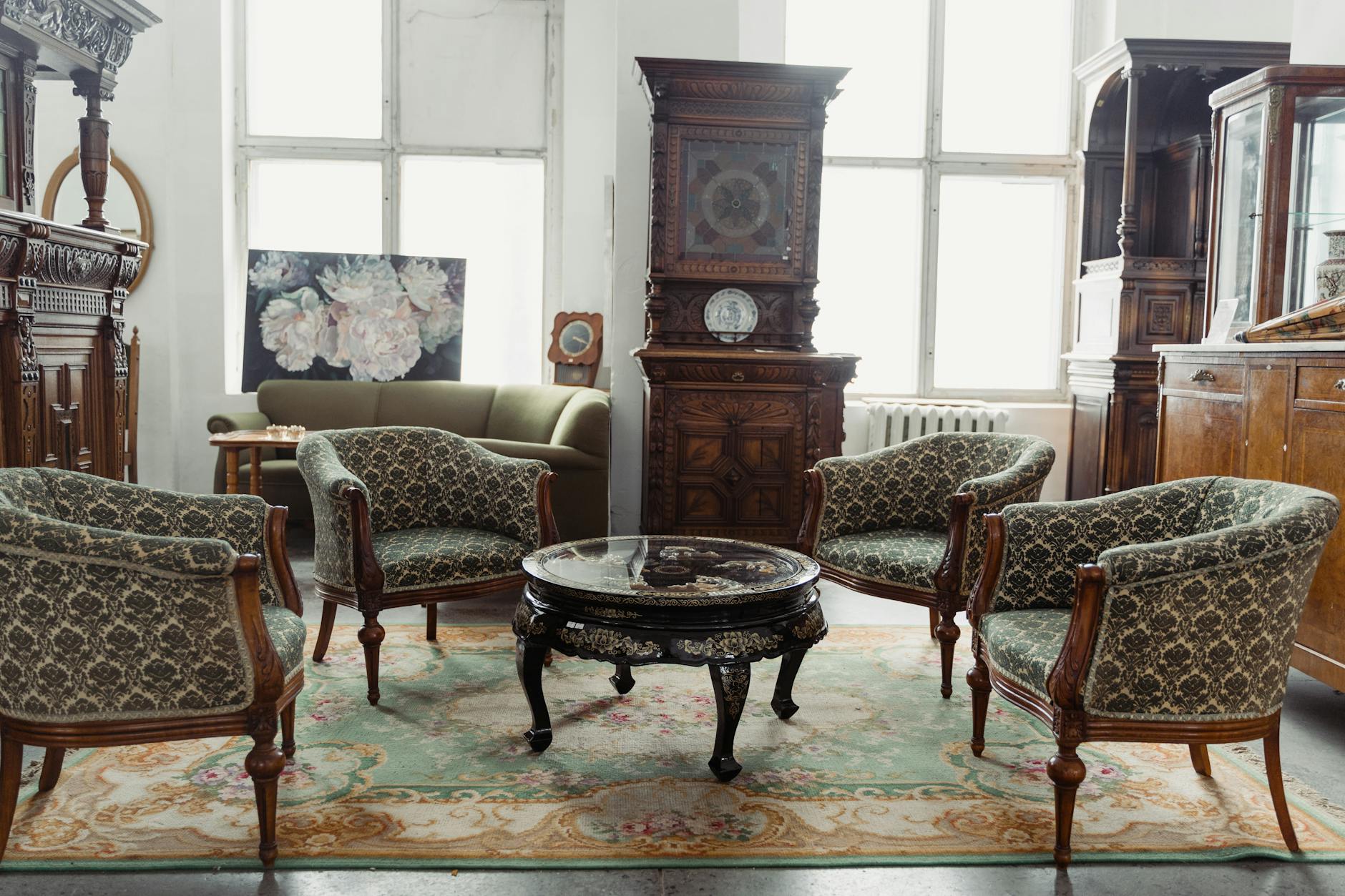 The interior of an antique shop filled with vintage furniture and collectables