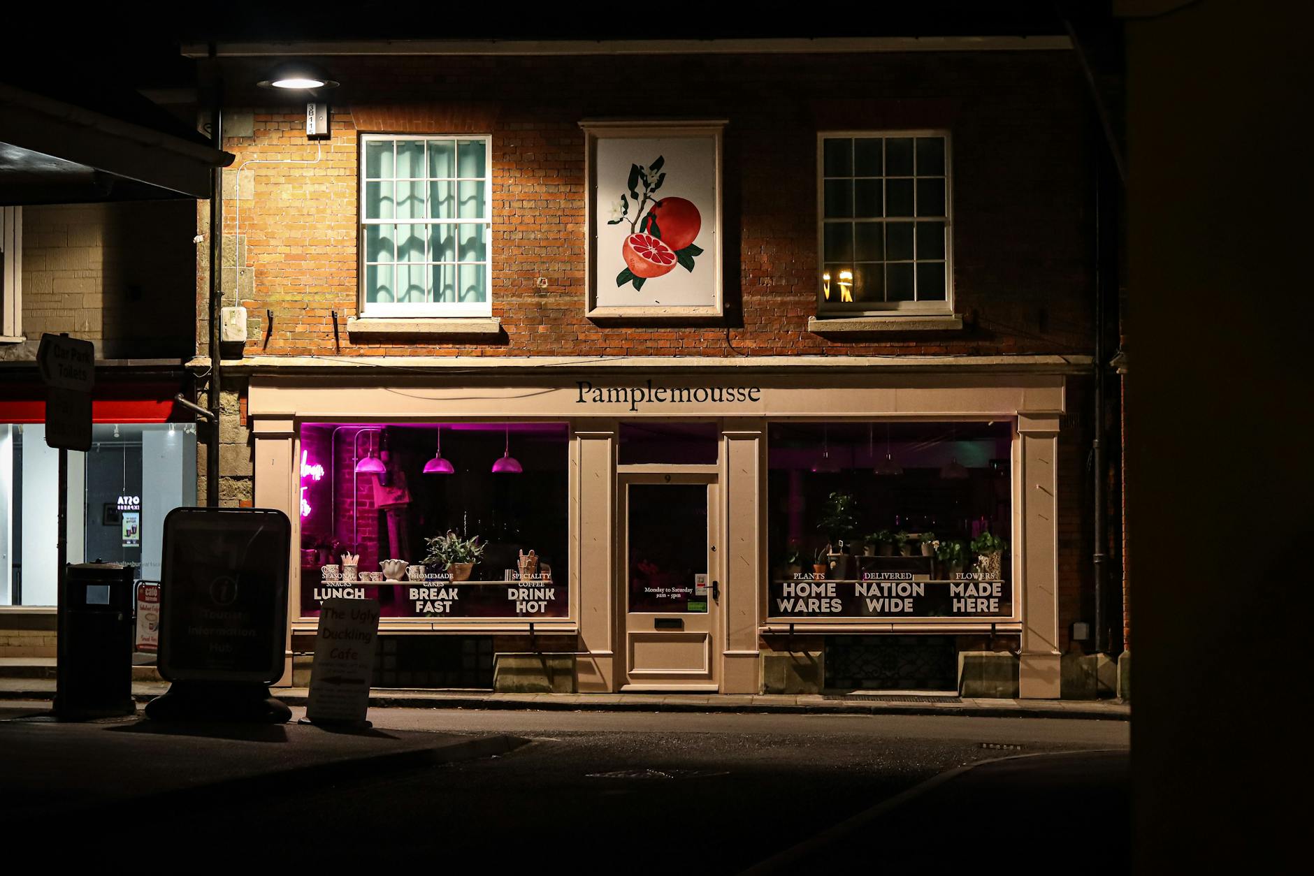 A charming independent boutique shop front in a Cotswolds village