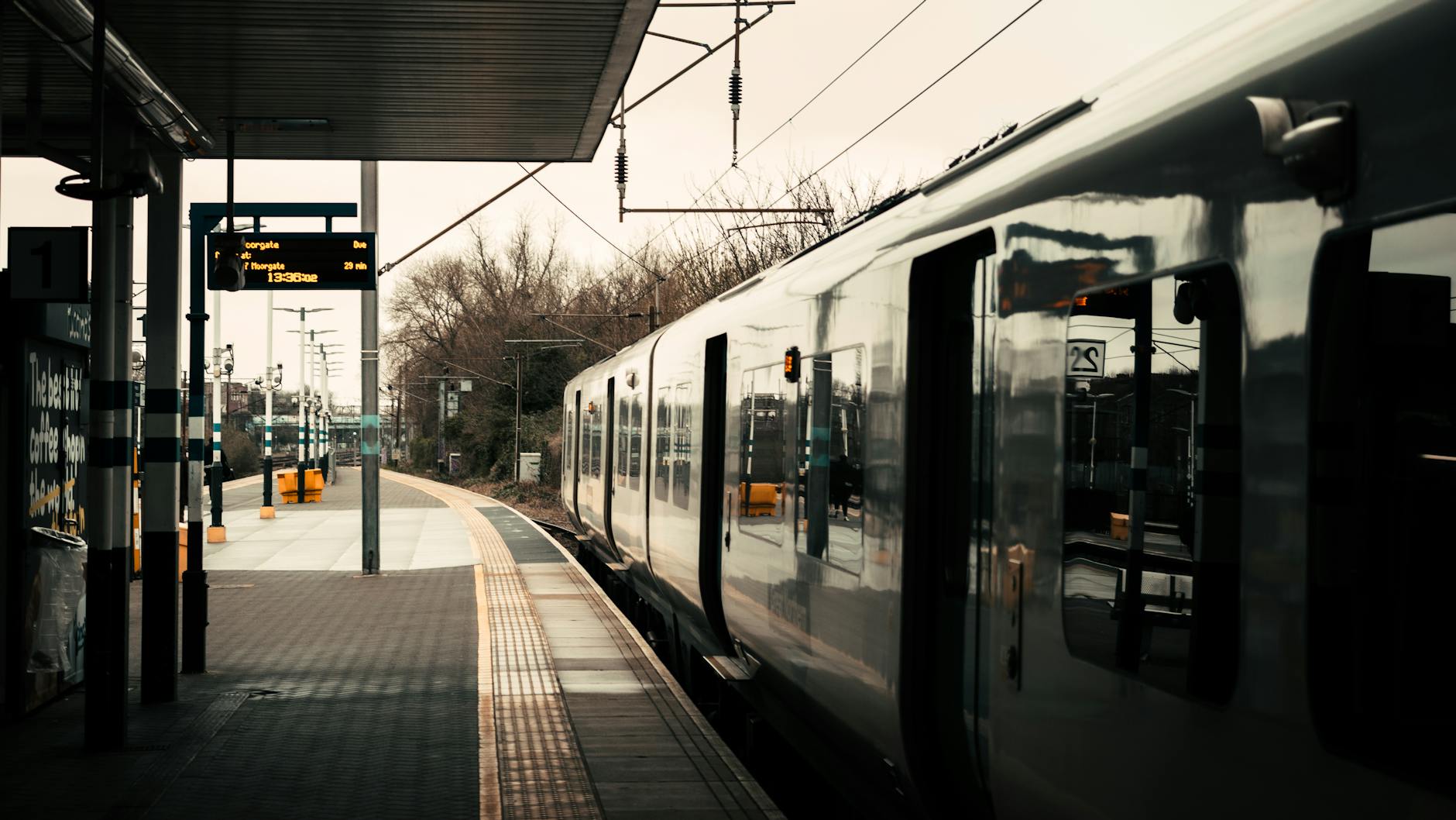 A charming rural train station platform in the English countryside