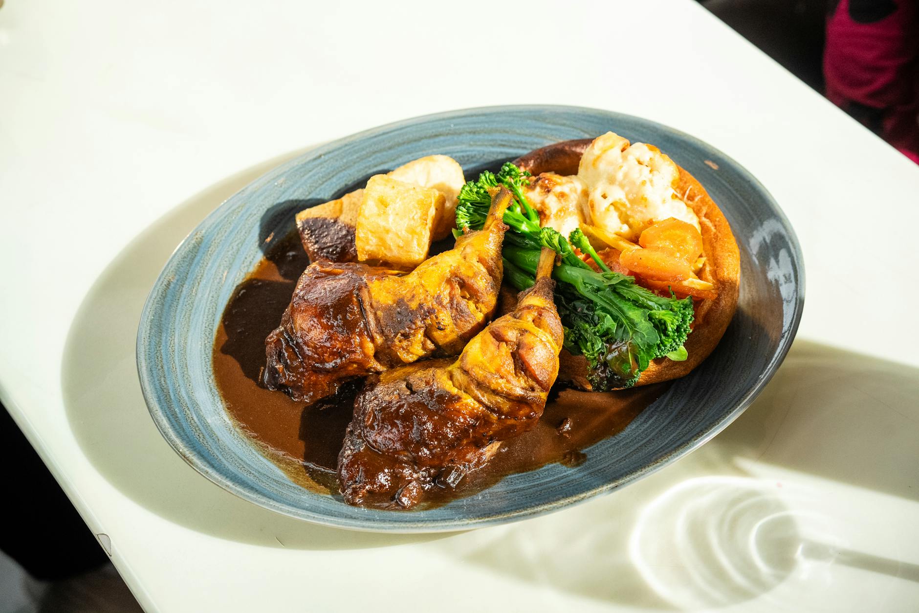 A traditional English Sunday roast dinner served in a Cotswolds pub