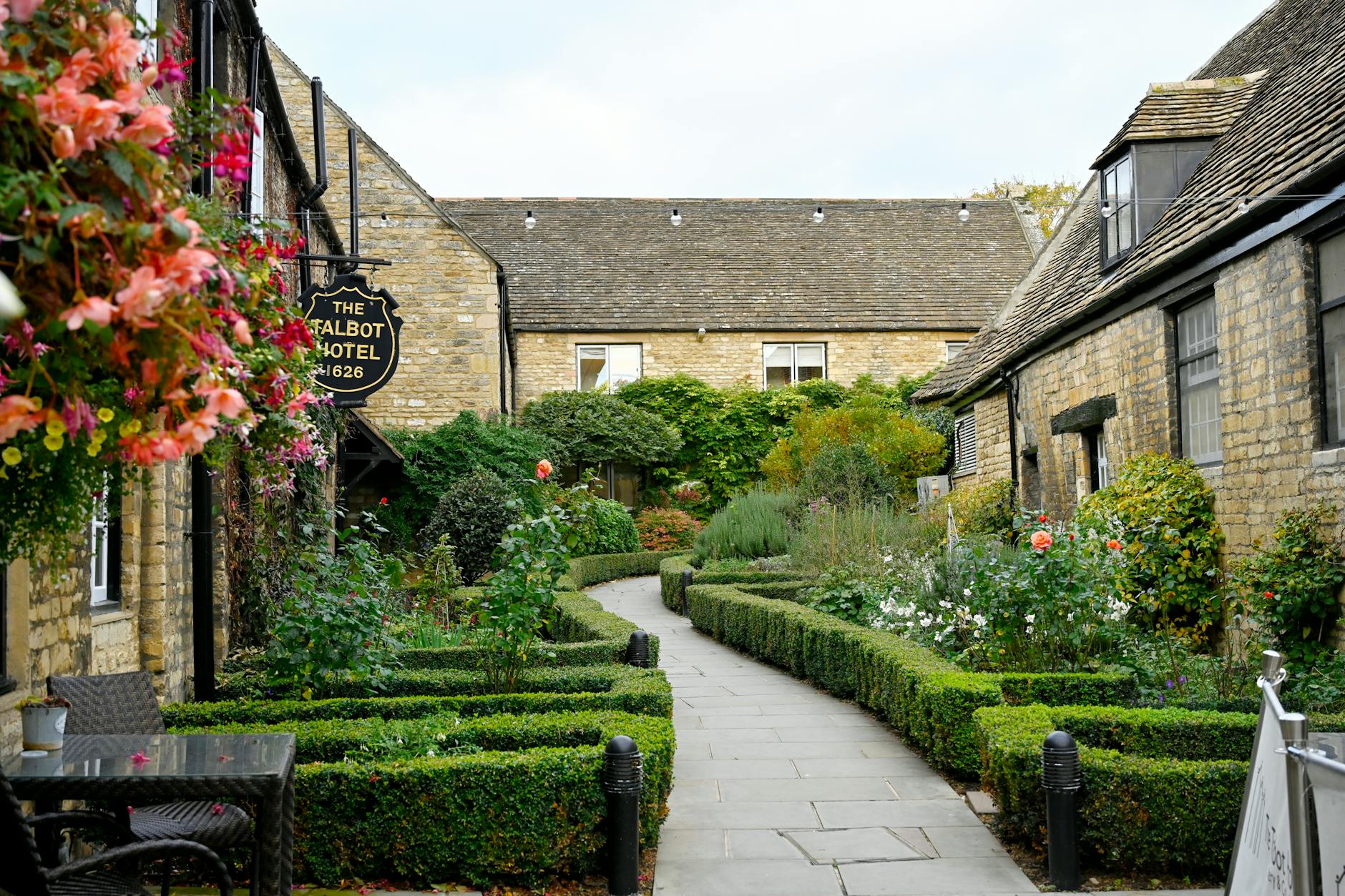 A characterful Cotswold hotel courtyard for an overnight stay