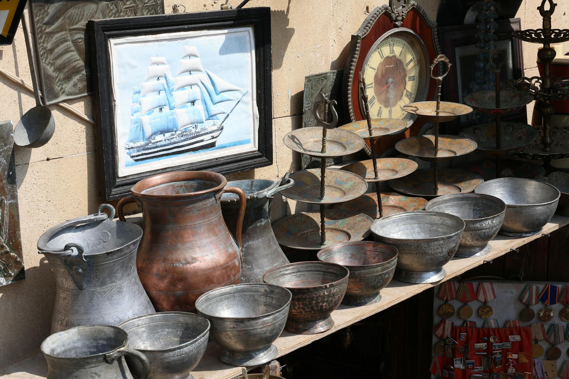 Antique display of silver, metalware and paintings in the Cotswolds