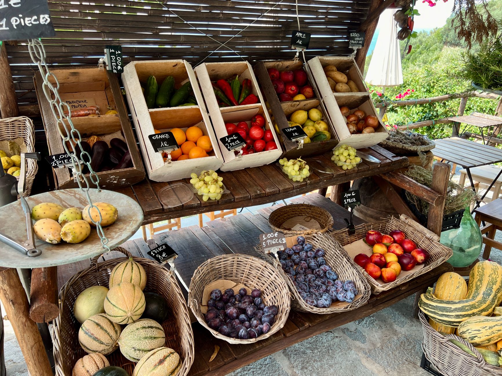 Fresh fruit and vegetables on a rustic outdoor market stall