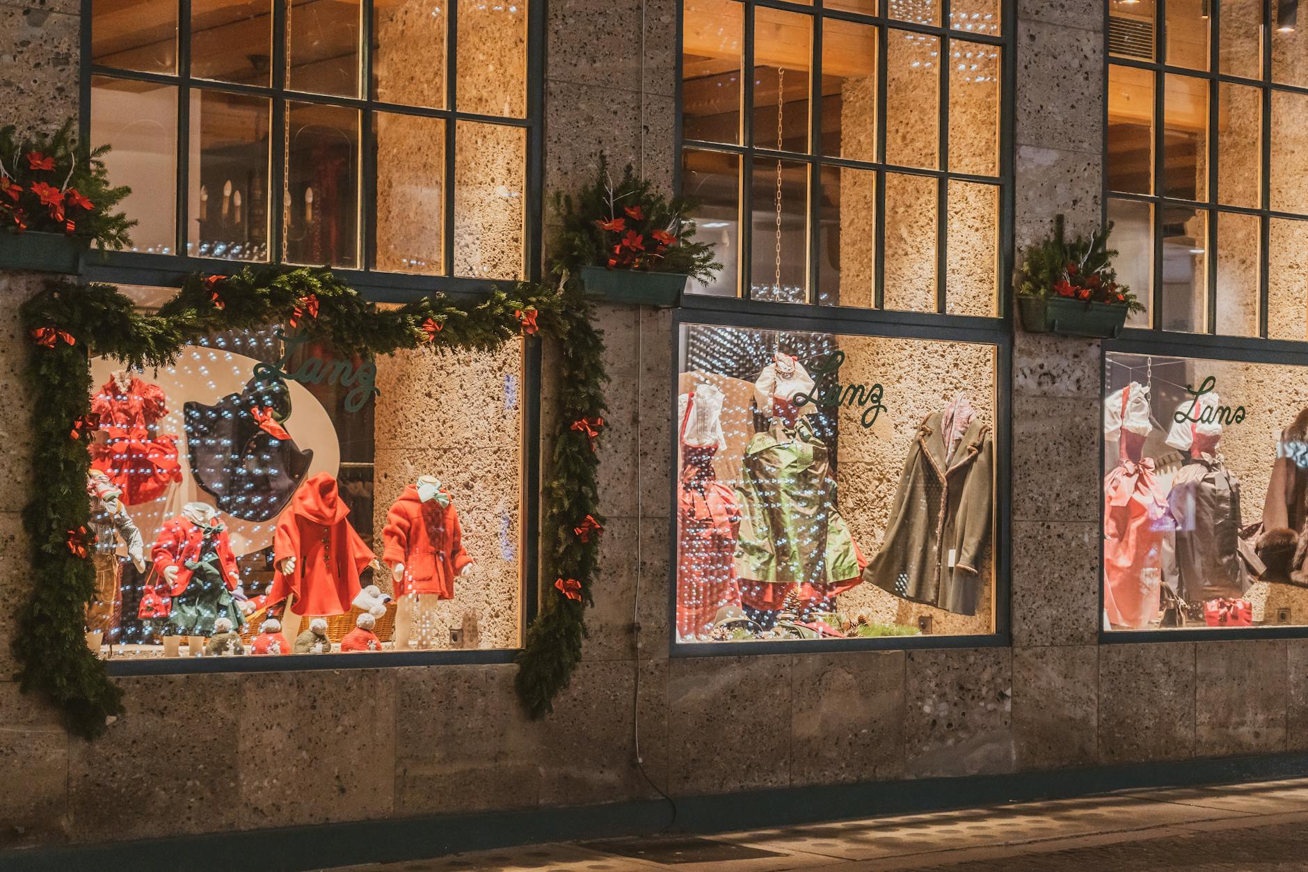 A festive shop window display during Cotswolds Christmas shopping