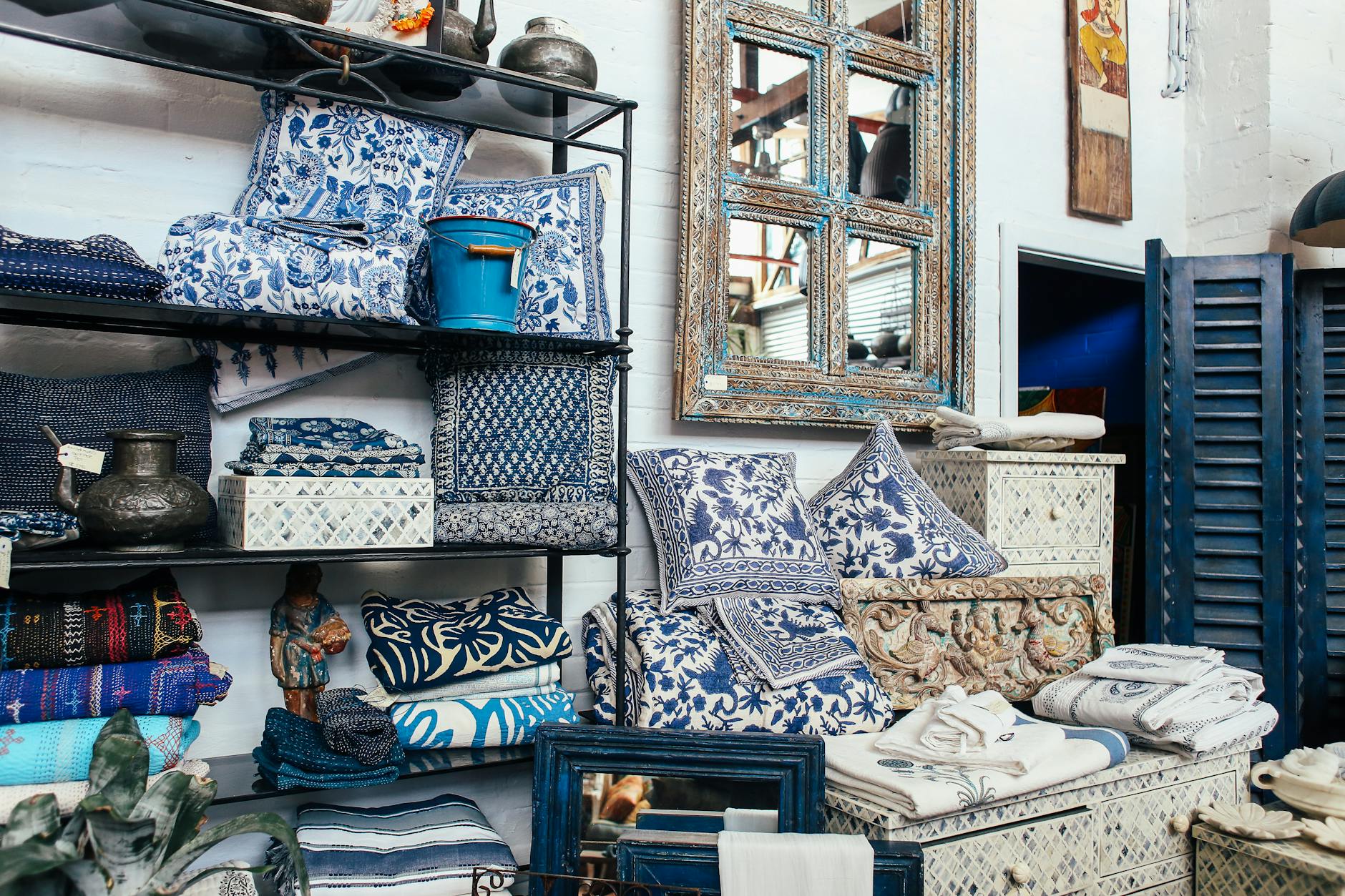 A Tetbury shop window displaying decorative antiques and homeware