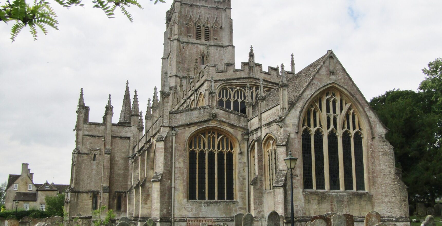 The pinnacled Perpendicular exterior of St Peter and St Paul church at Northleach, the Cathedral of the Cotswolds